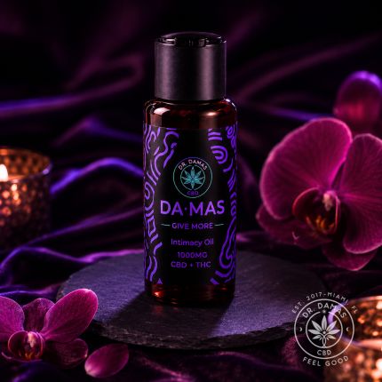 DA-MAS intimacy oil CBD THC luxury bottle purple silk background Dr Damas